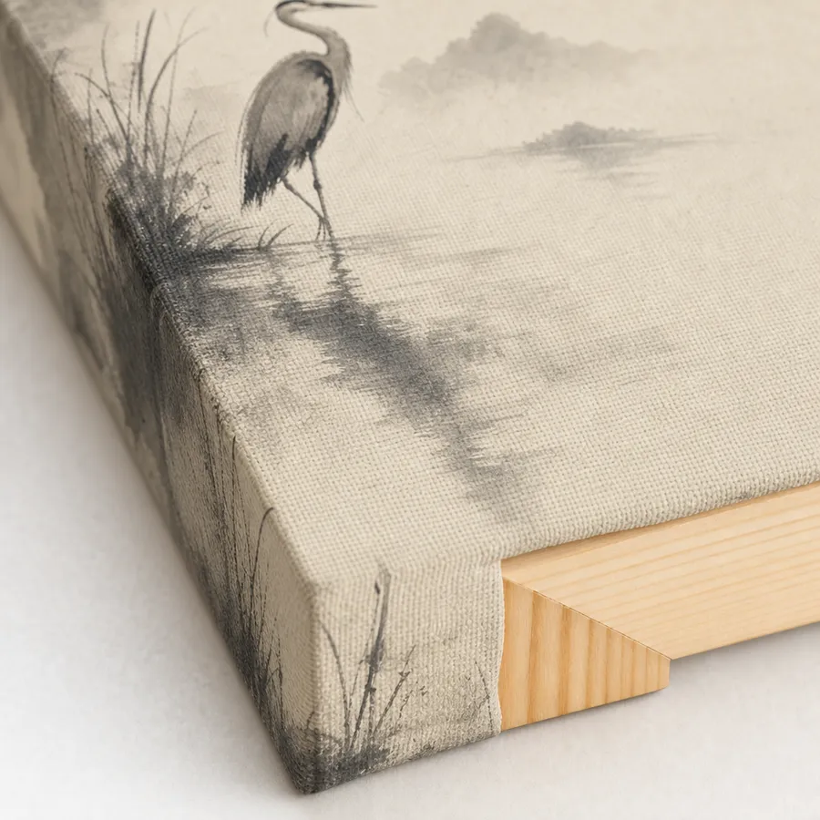 The corner of a gallery canvas, the ink-wash heron wrapping round the edge onto the pine bar